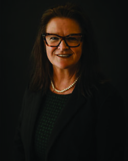 Headshot of Janet Buzzard in dark blazer and dress on a dark background Dr. Janet Buzzard Speaks at Women in Business Conference thumbnail